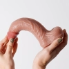 Dildo realistyczne Crushious Inviktus płynny silikon 22 cm cielisty