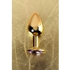 Golden anal plug TOYFA Metal,with a amethyst colored gem