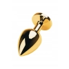 Gold anal plug TOYFA Metal with green round-shaped gem